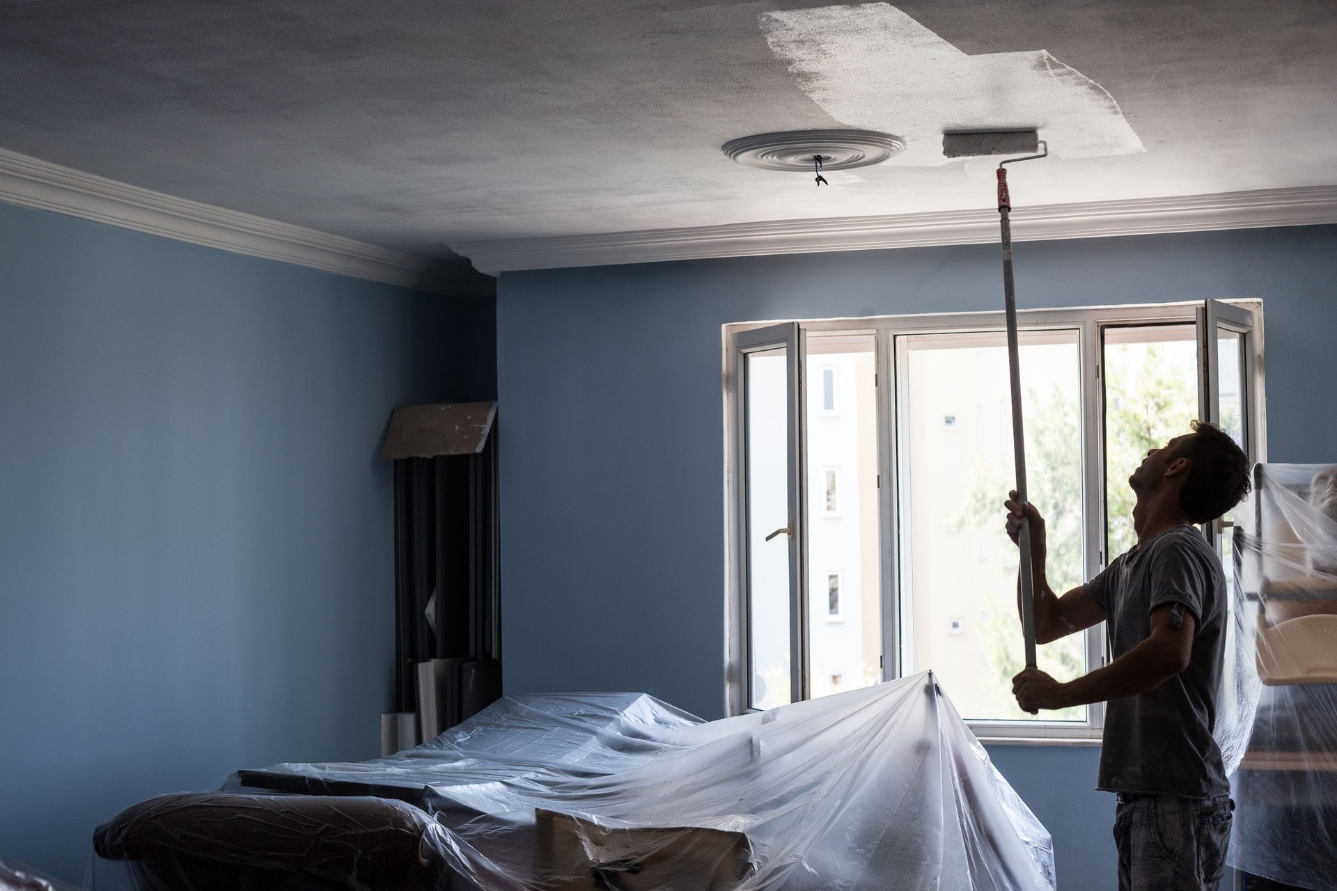 Portrait Of House Painter Working Indoor